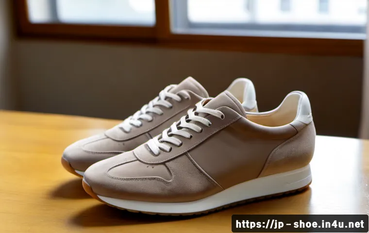 브루넬로 쿠치넬리 스니커즈 리뷰 - Photorealistic luxury sneaker review scene, pair of refined Italian-style taupe suede and cream leat...